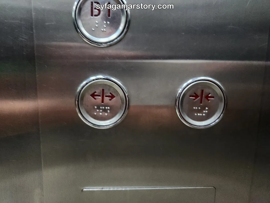 tombol buka tutup lift