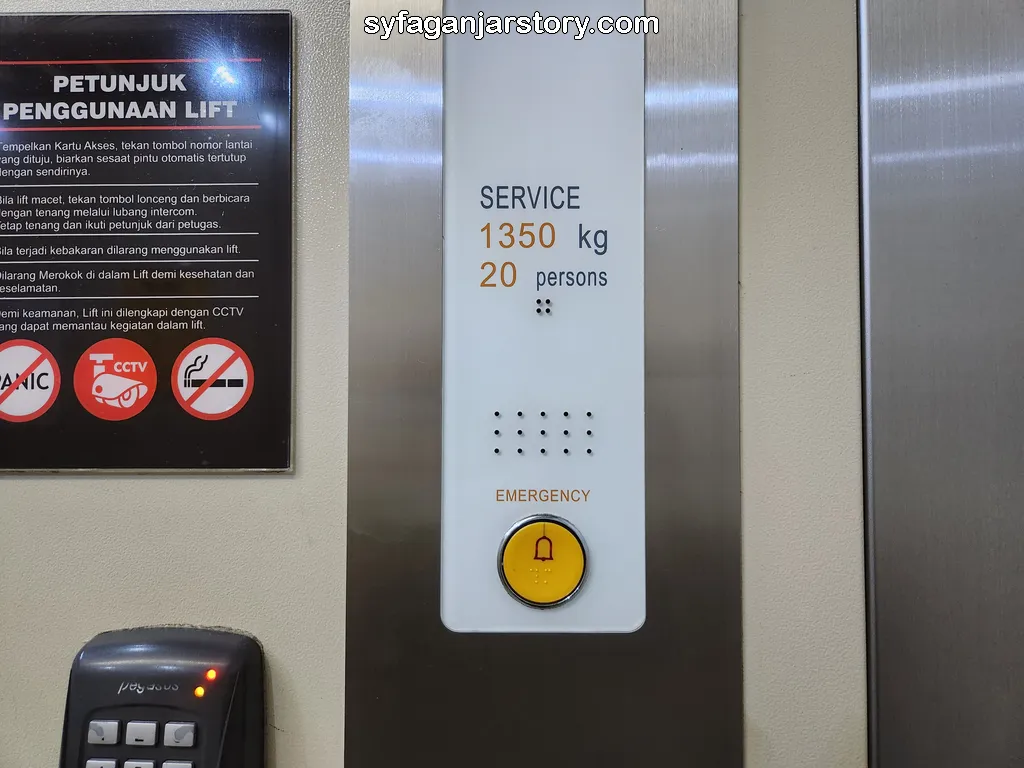 tombol emergency lift